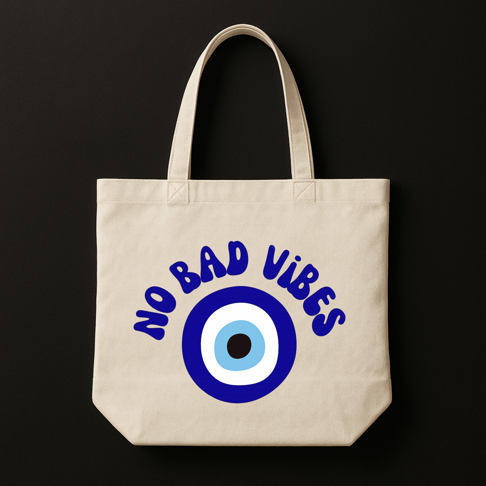 44 The "Evil Eye" Protector | Premium Off-White Canvas Tote bag - Image 1
